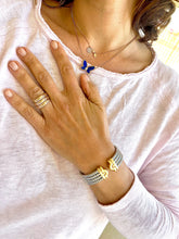 Charger l'image dans la galerie, Bracelet de la Maison Bvlgari,collection Parentesi en acier et or jaune