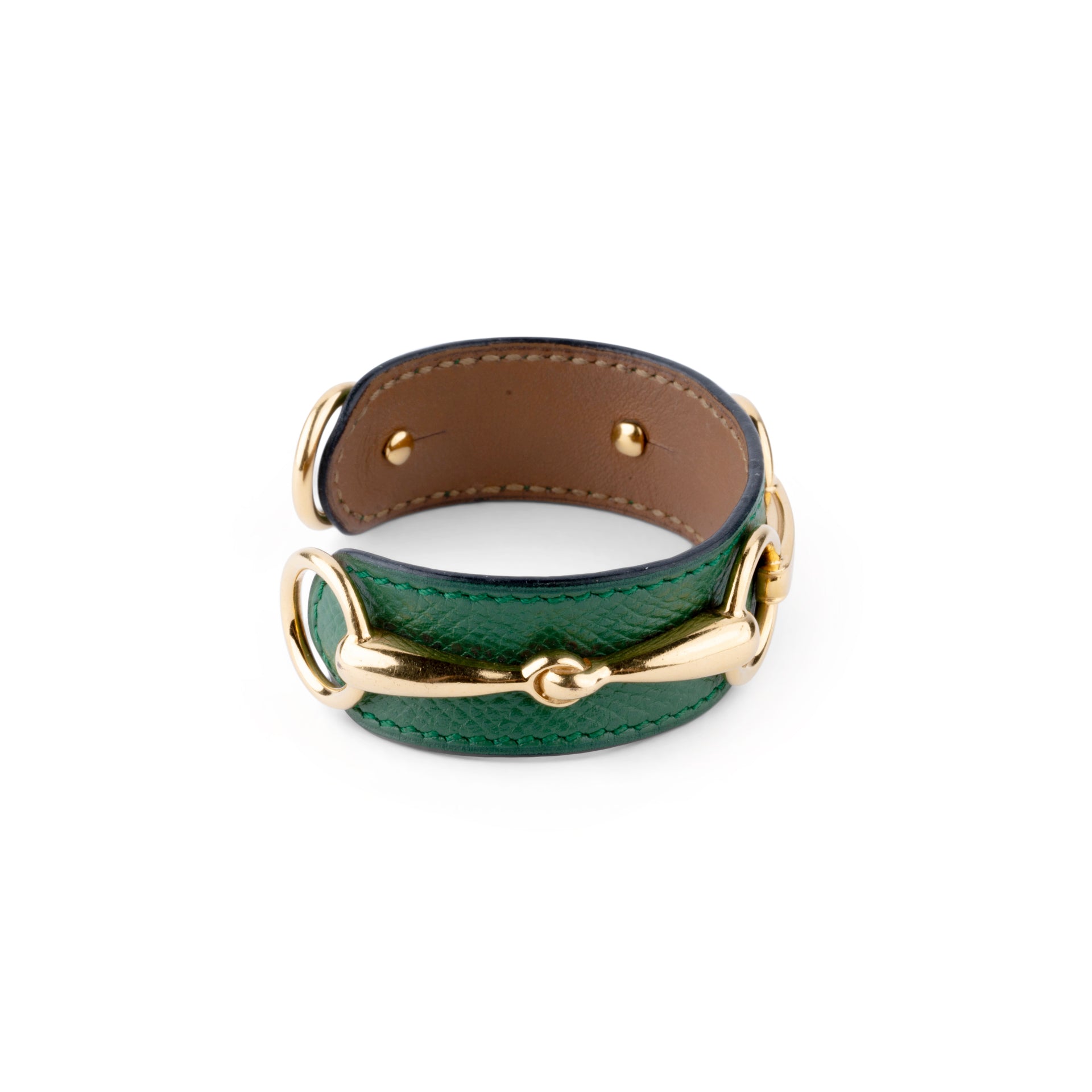 Bracelet de la maison Hermès en cuir et métal doré