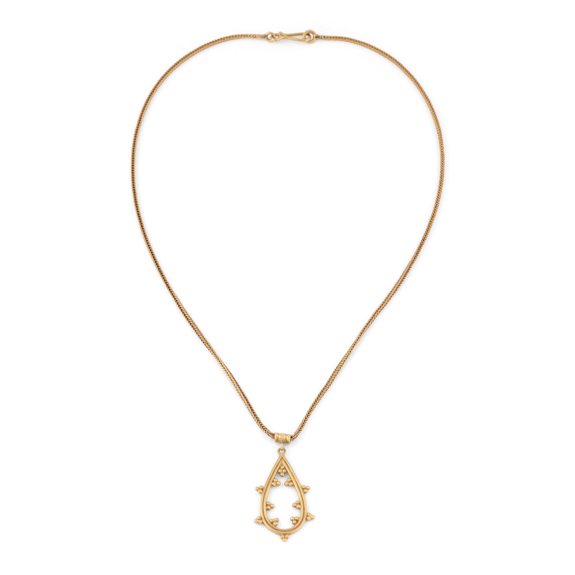 Chaîne en or jaune et pendentif assorti ciselé du créateur grec Zolotas