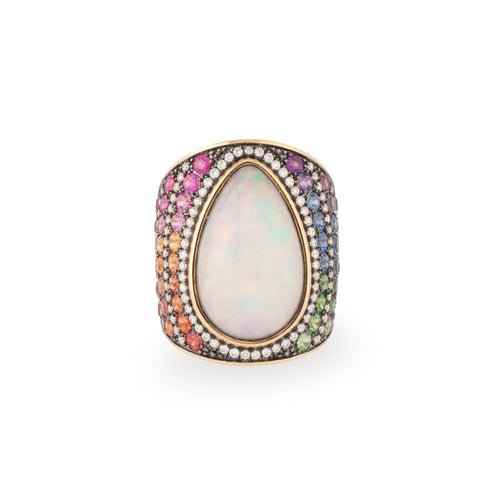 Yellow gold ring adorned with an opal cabochon and multi-colored sapphires