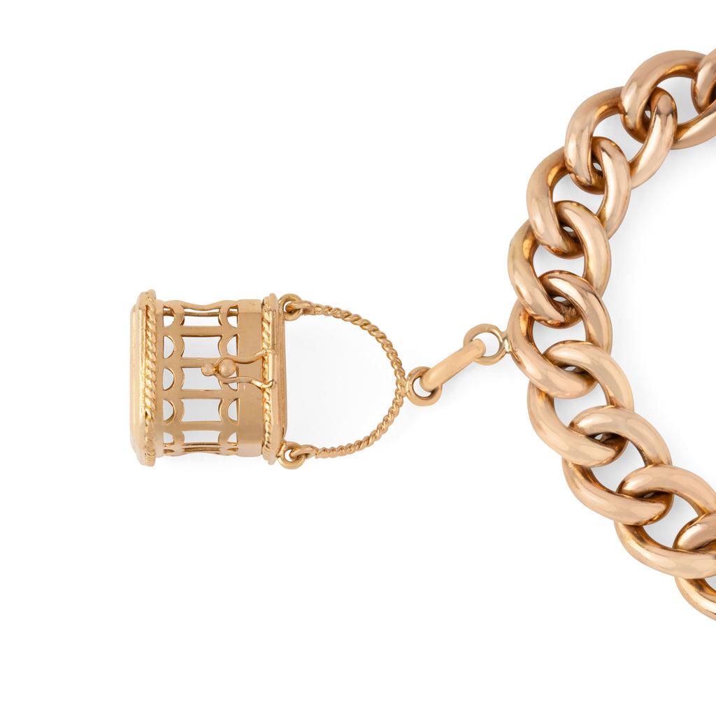 Bracelet or rose 18k,maillon gourmette orné de 4 breloques