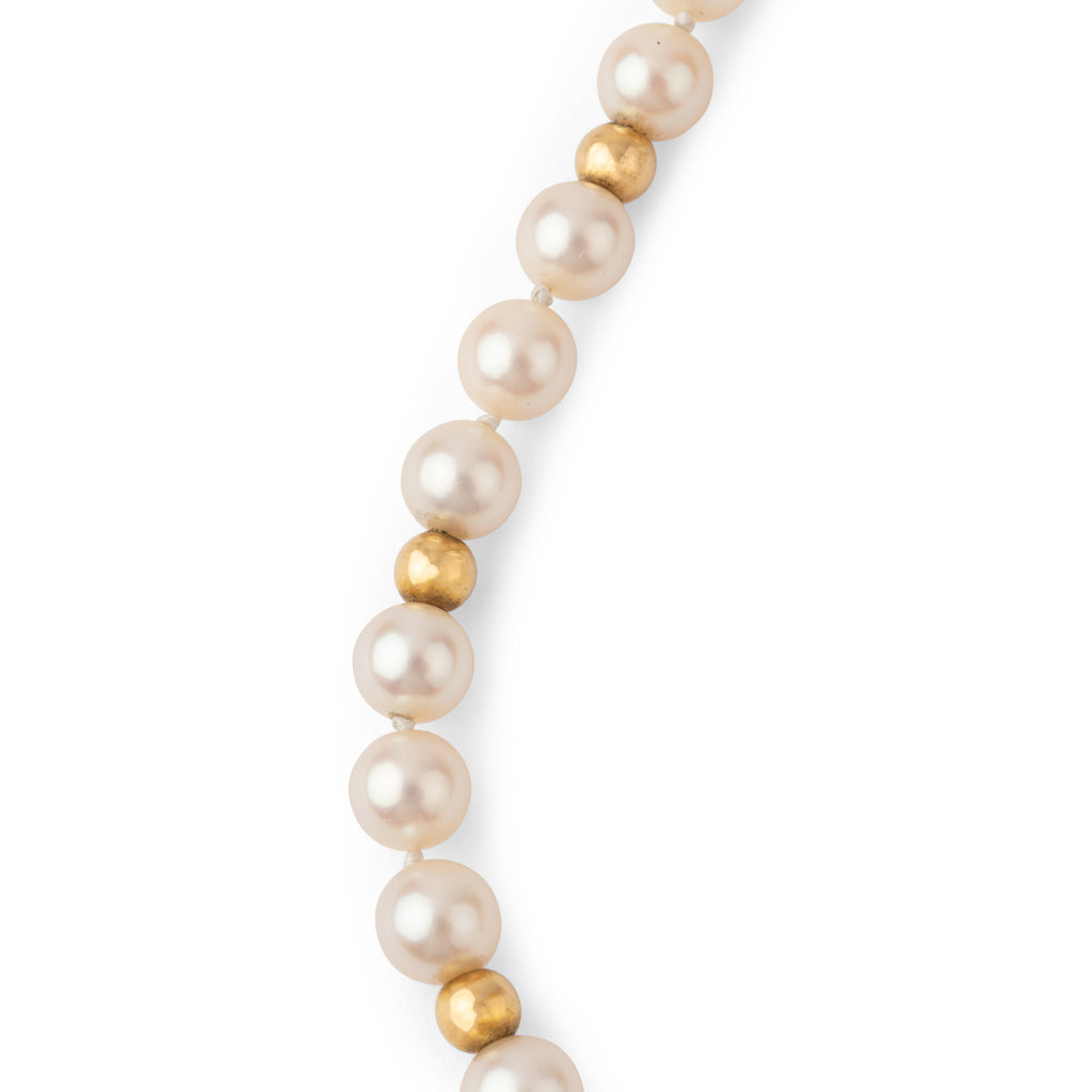 Collier perles Akoya et boule d'or fermoir menottes de la maison Dinh Van