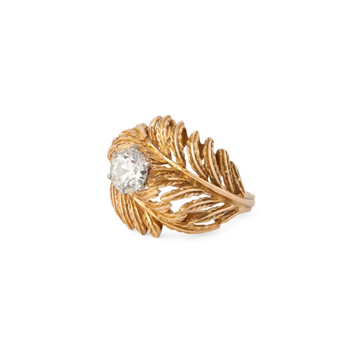 Feather-shaped yellow gold ring set with a solitaire