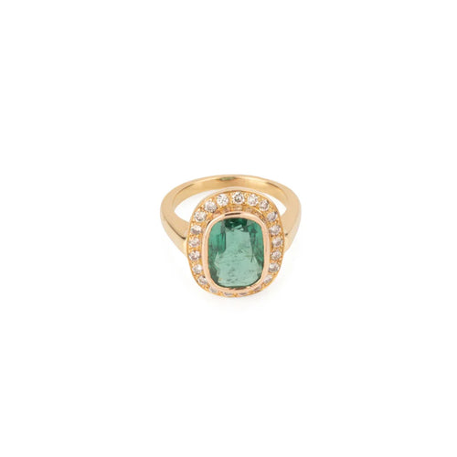 Yellow gold ring adorned with an emerald