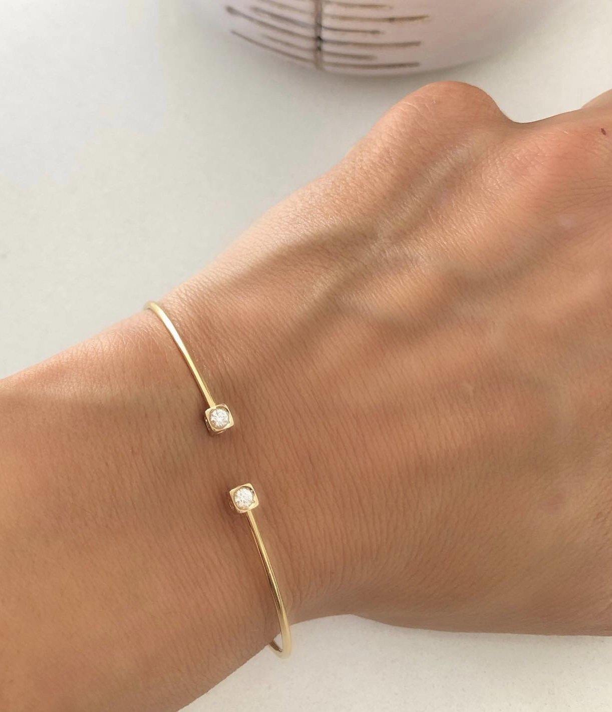 Bracelet or jaune modèle cube de la maison Dinh Van - adalgyseboutique