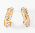 Boucles d'oreilles or jaune et diamant de la maison Cartier modèle Trinity
