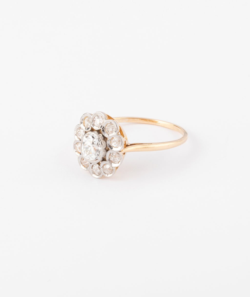Bague marguerite ancienne en or et diamant