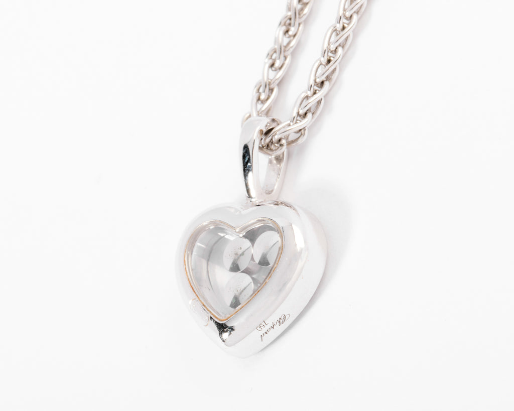 Un pendentif or gris signé de la maison Chopard