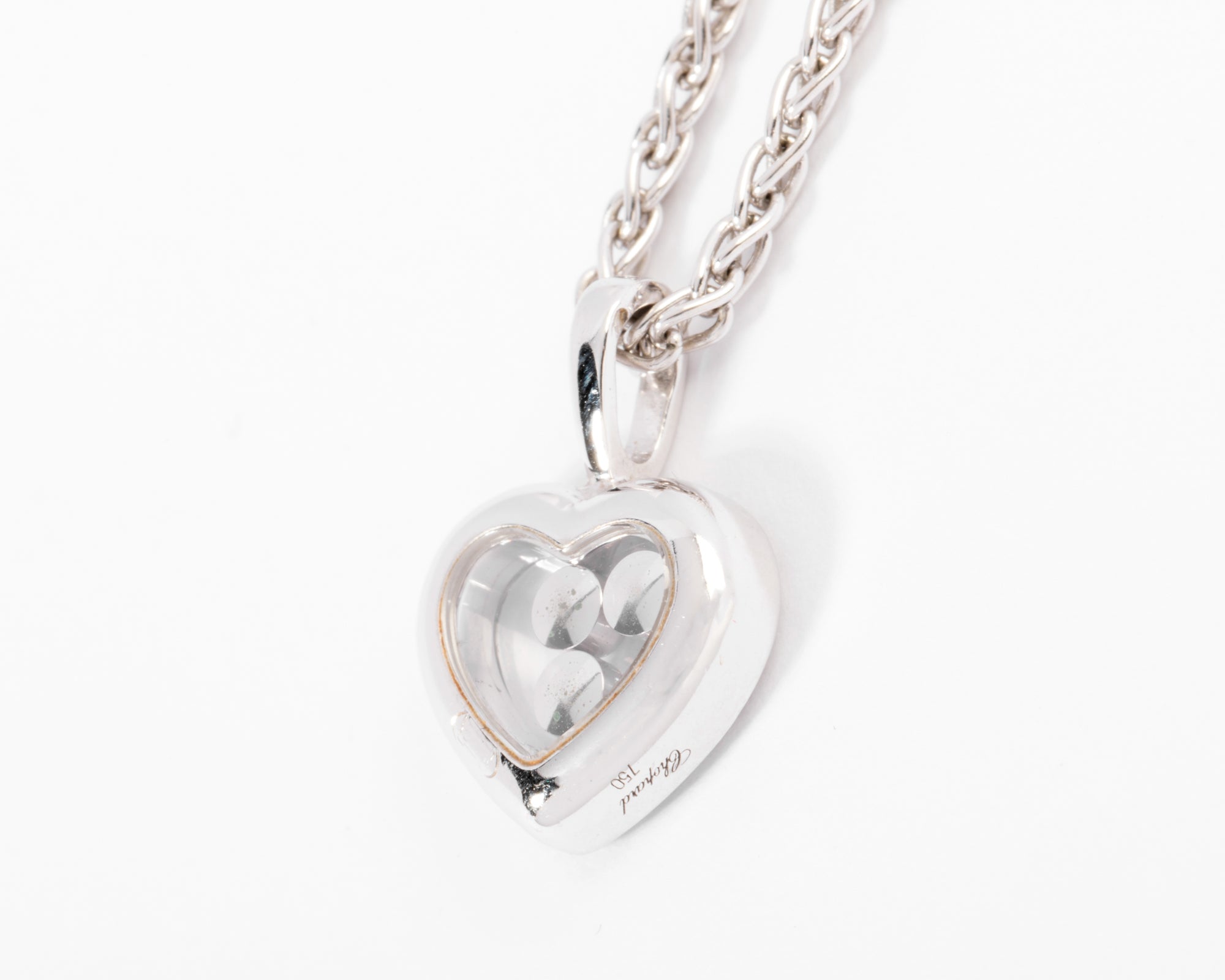 Un pendentif or gris signé de la maison Chopard