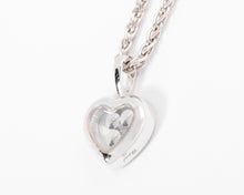 Charger l'image dans la galerie, Un pendentif or gris signé de la maison Chopard
