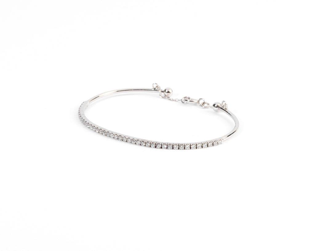 Bracelet demi jonc or gris et diamant sur le dessus