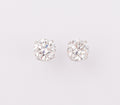 Paire de puce en diamant sur or gris 4 griffes