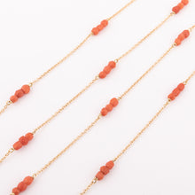 Charger l'image dans la galerie, Sautoir en or jaune et  boules de corail facettés
