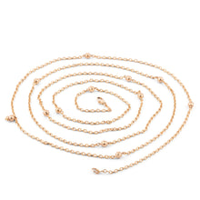 Charger l'image dans la galerie, Sautoir ancien en or jaune orné de petites boules
