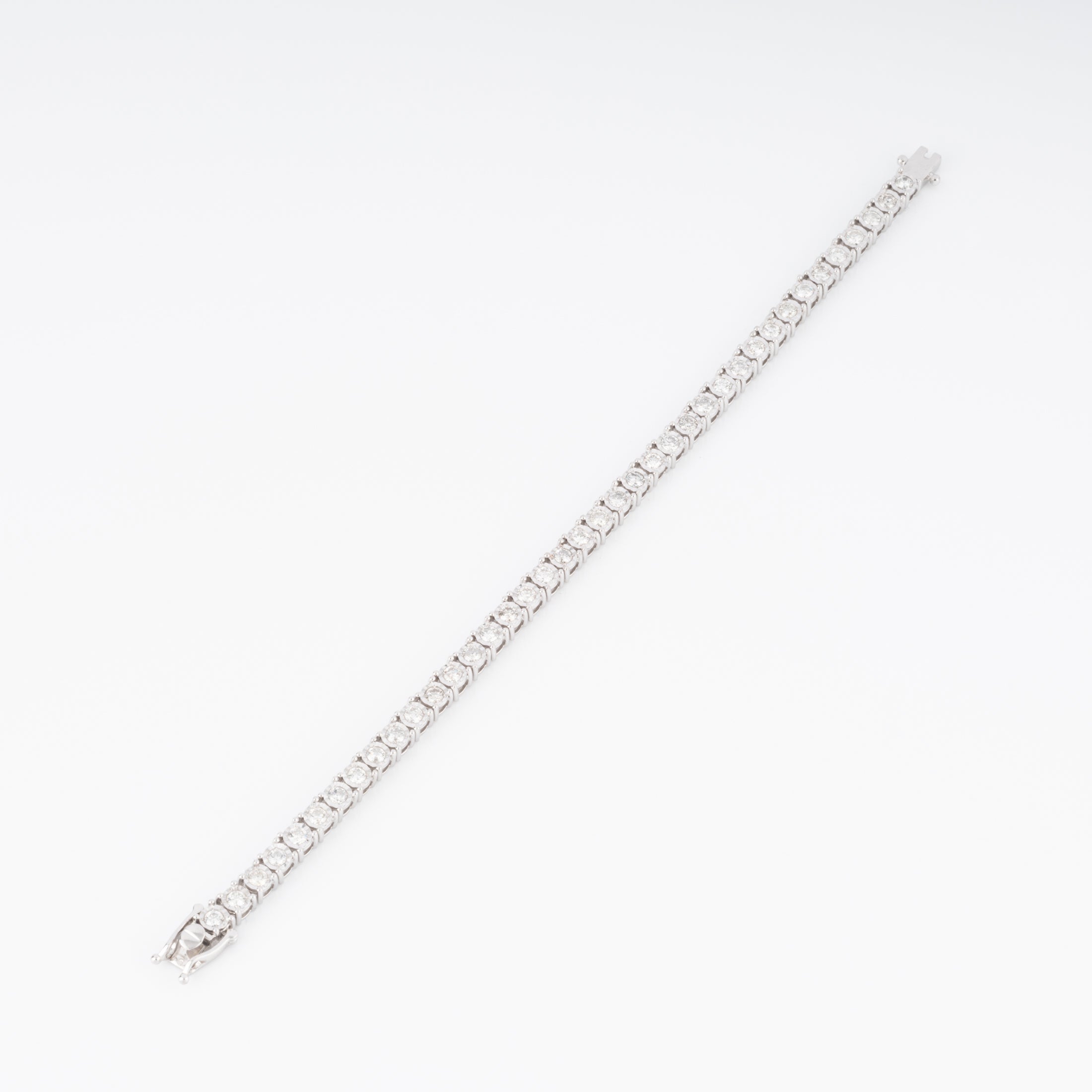 Bracelet riviere et or gris orné de diamant