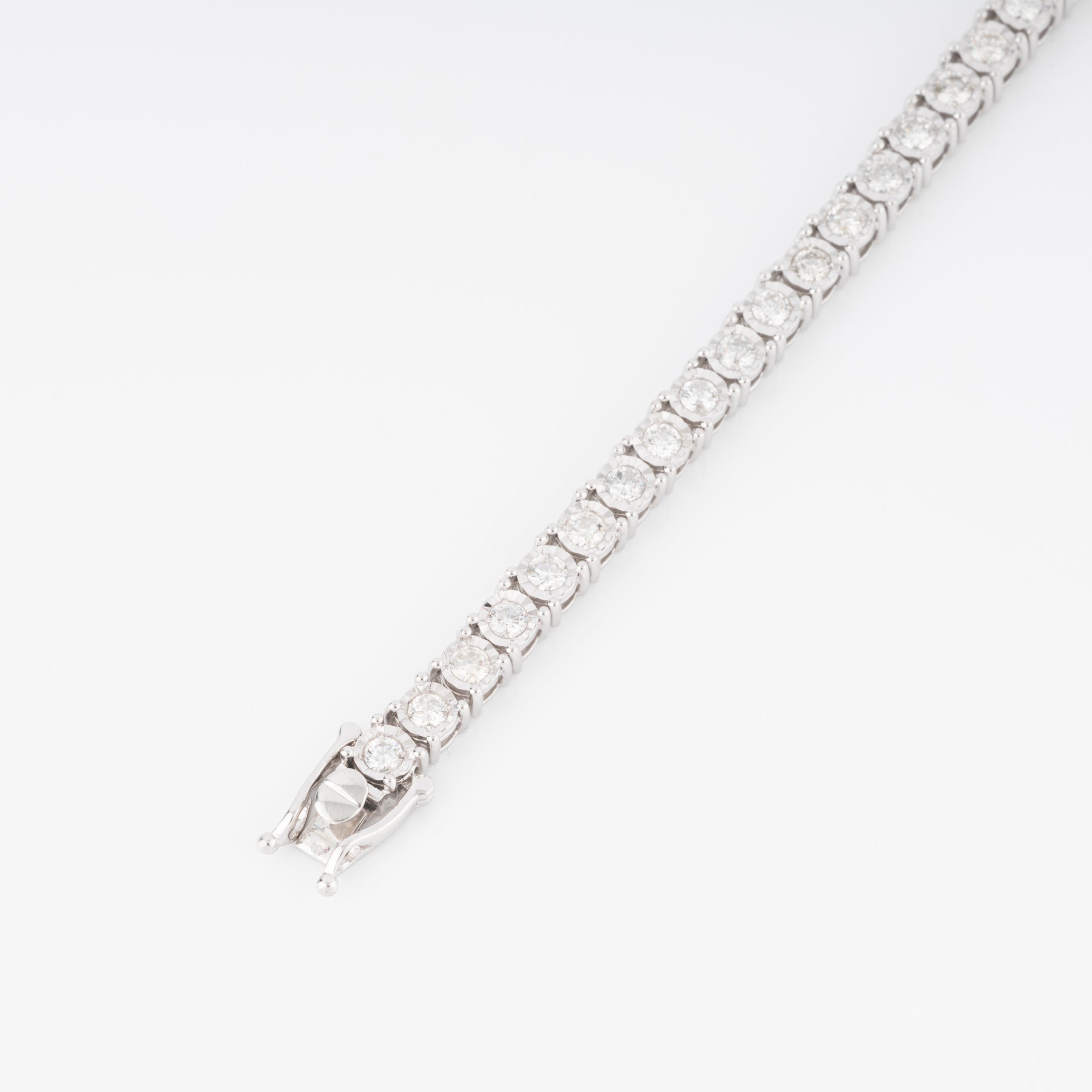 Bracelet riviere et or gris orné de diamant