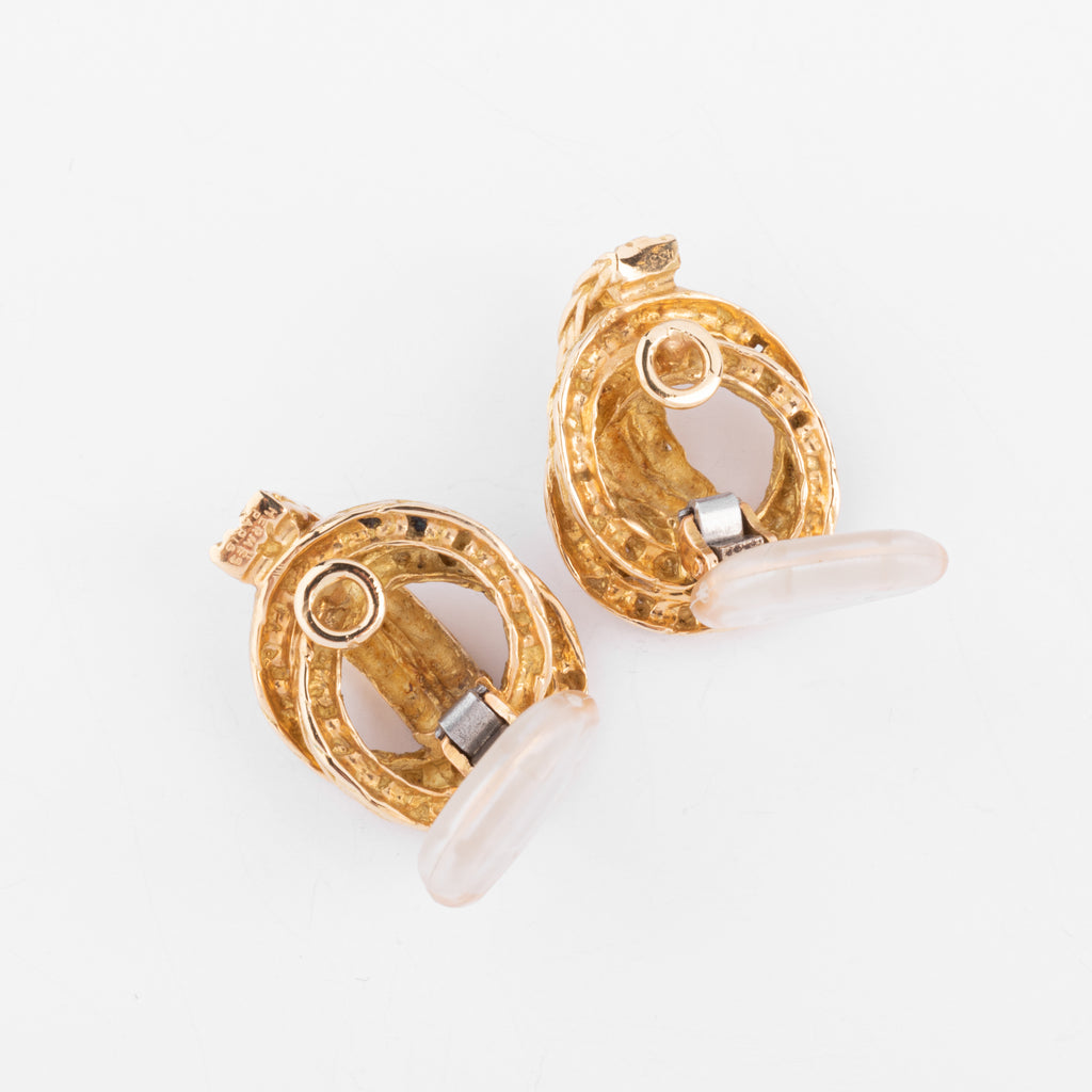 Boucles d'oreilles or jaune signée Hermès