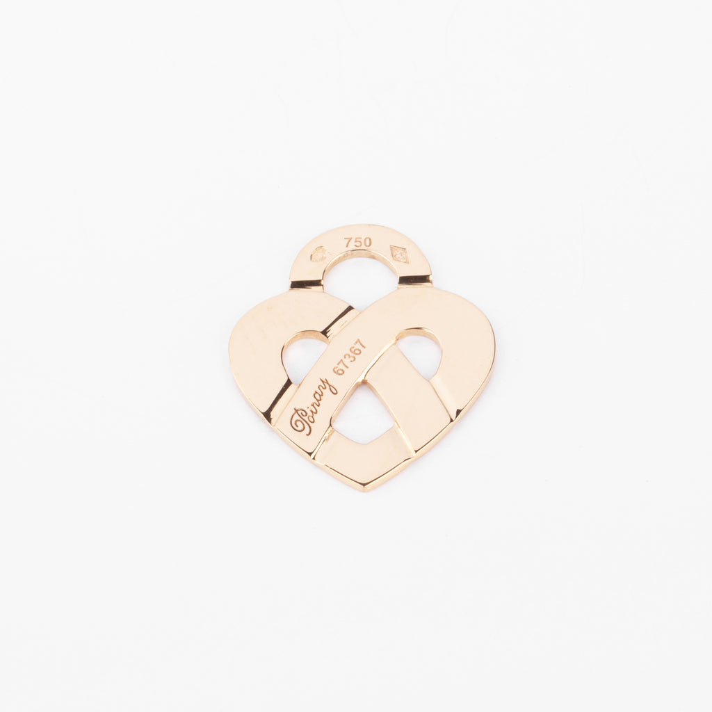 Pendentif en or jaune formant un cœur de la maison Poiray