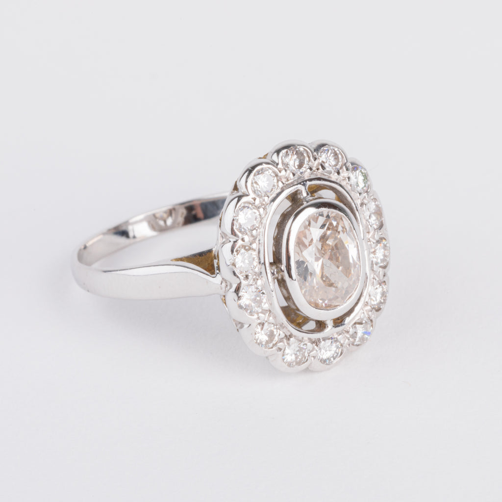 Bague marguerite en or gris et diamant