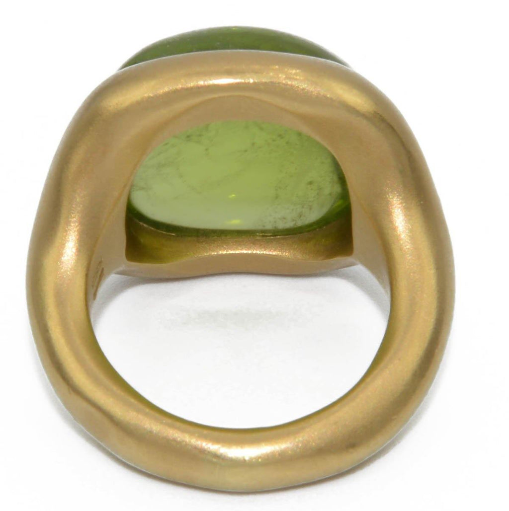 Bague signée Pomellato ornée d'un péridot - adalgyseboutique