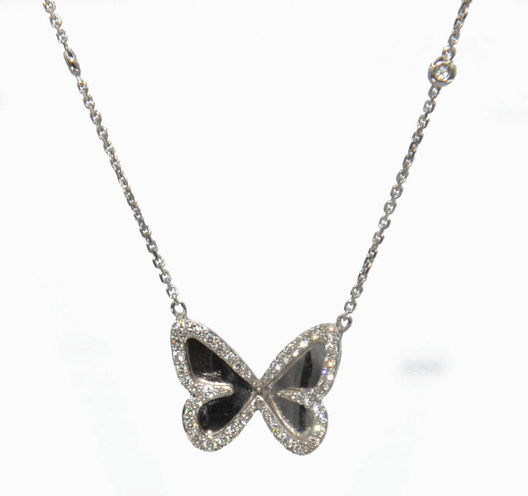 Pendentif en or gris diamants avec pendentif papillon