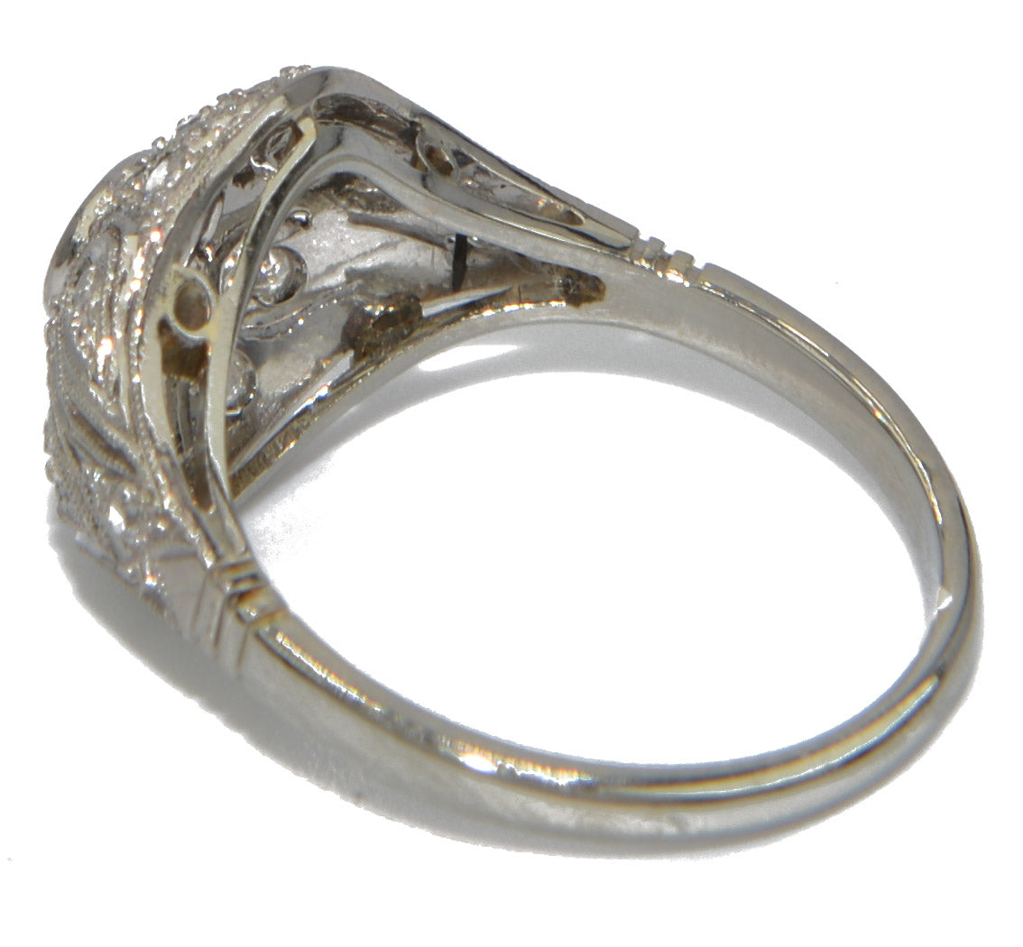 Bague dôme ajourée en diamant en platine