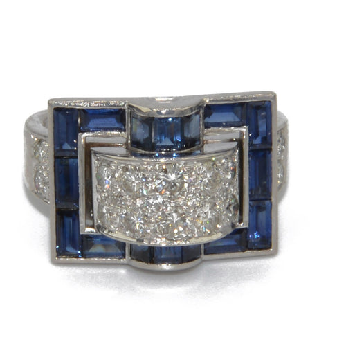 White gold ring with calibrated blue sapphires