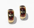 Boucles d'oreilles en or jaune de la maison Pomellato avec des cabochons de grenats