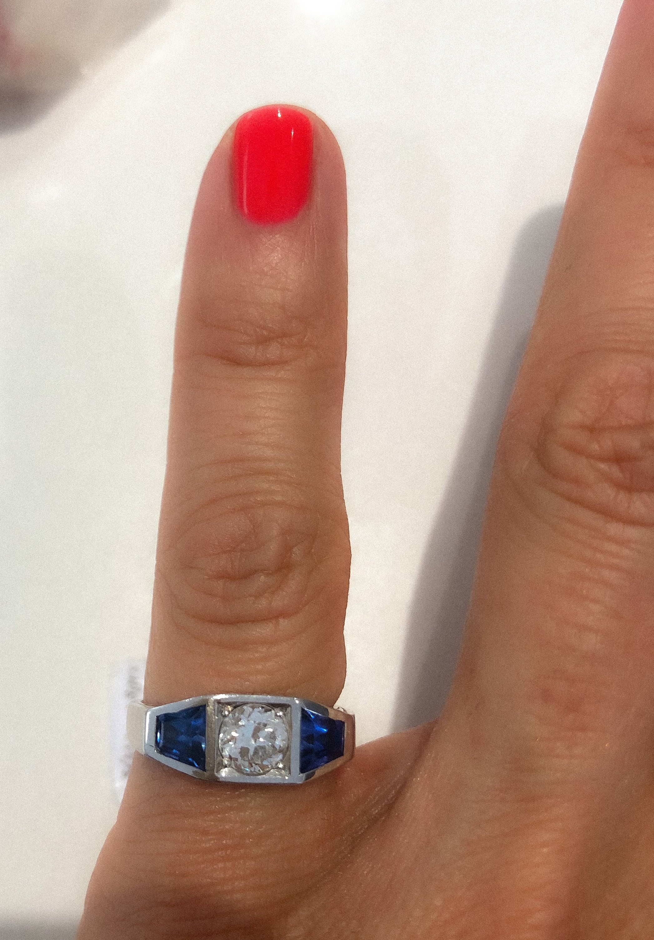 Bague jarretière en or gris diamant et saphirs