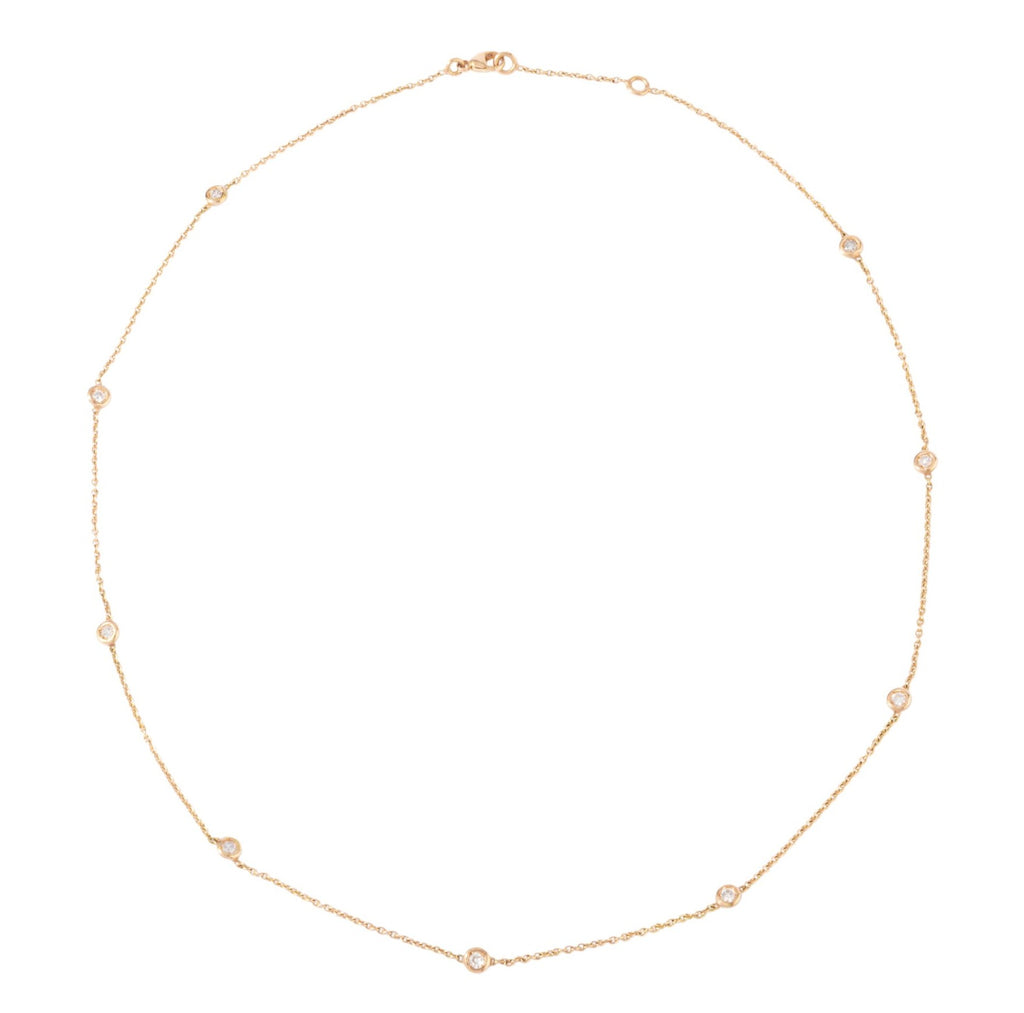 Collier or jaune intercalé de diamant sur maille forçat