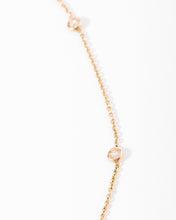 Charger l'image dans la galerie, Collier or jaune intercalé de 9 diamants sur maille forçat en sertis clos.
