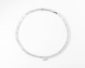 Collier rigide or gris de la maison Chaumet